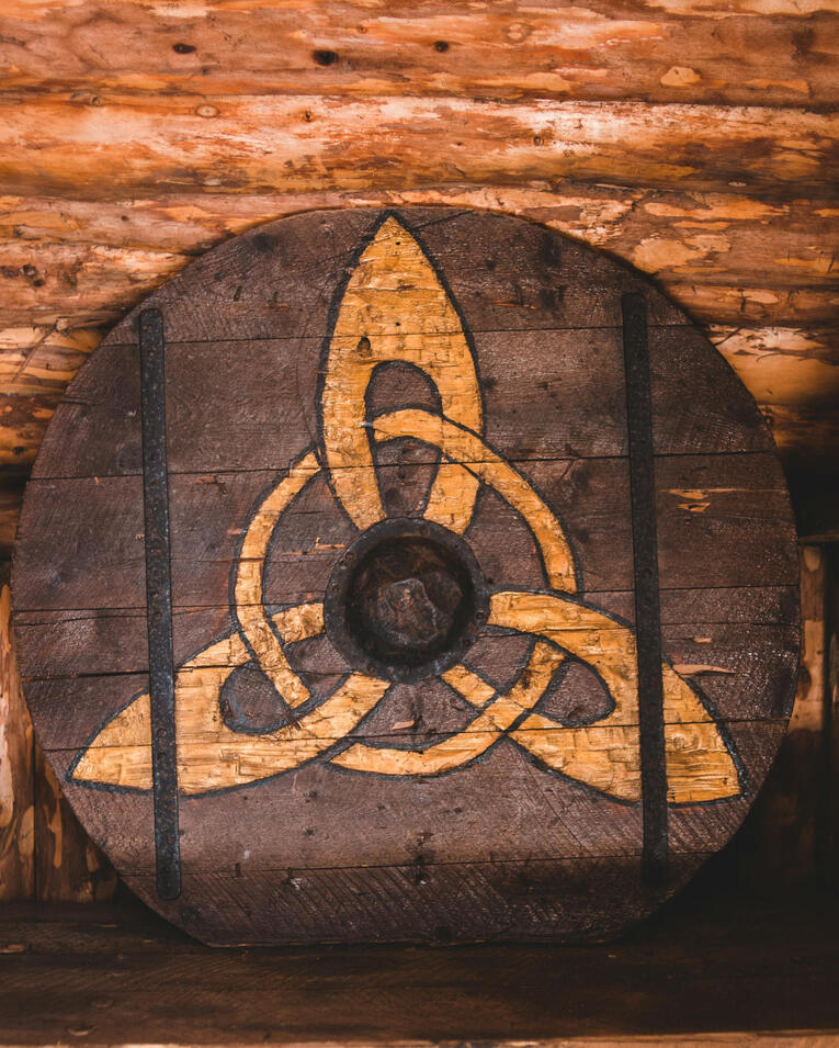 Metallic C M with sword and celtic spirals